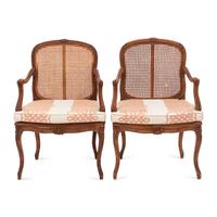 A Pair of Louis XV Style Cane Upholstered Fauteuils