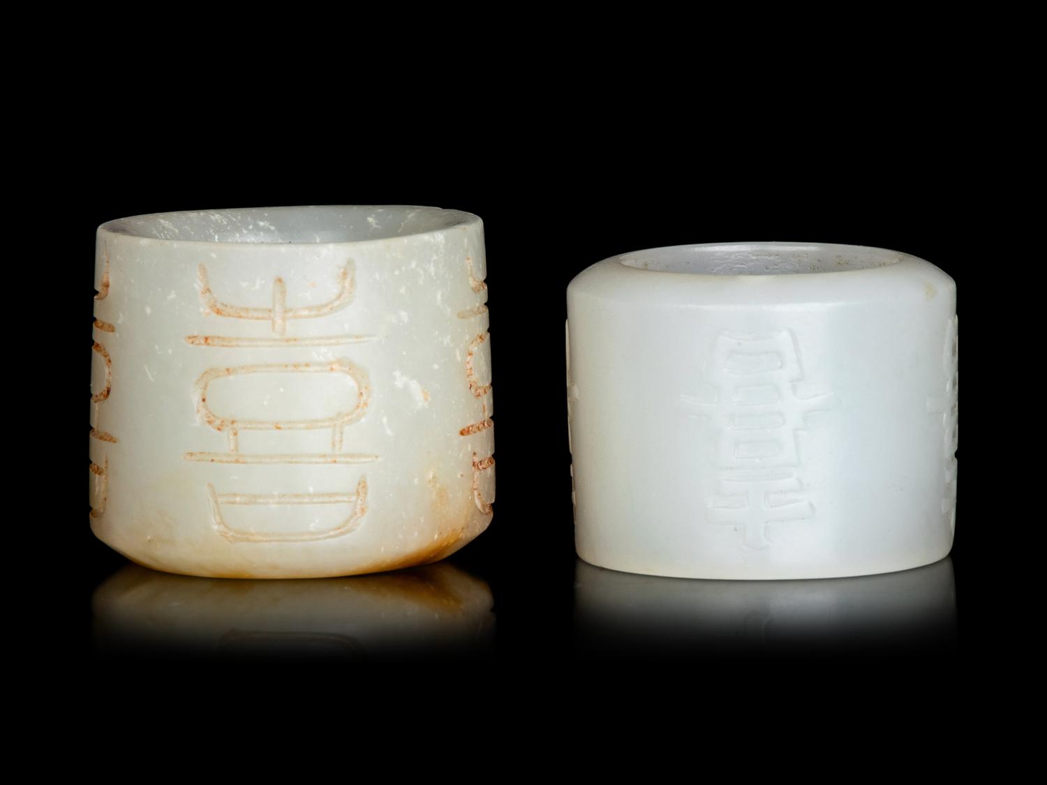 Two White Jade 'Happiness' Archer's Rings