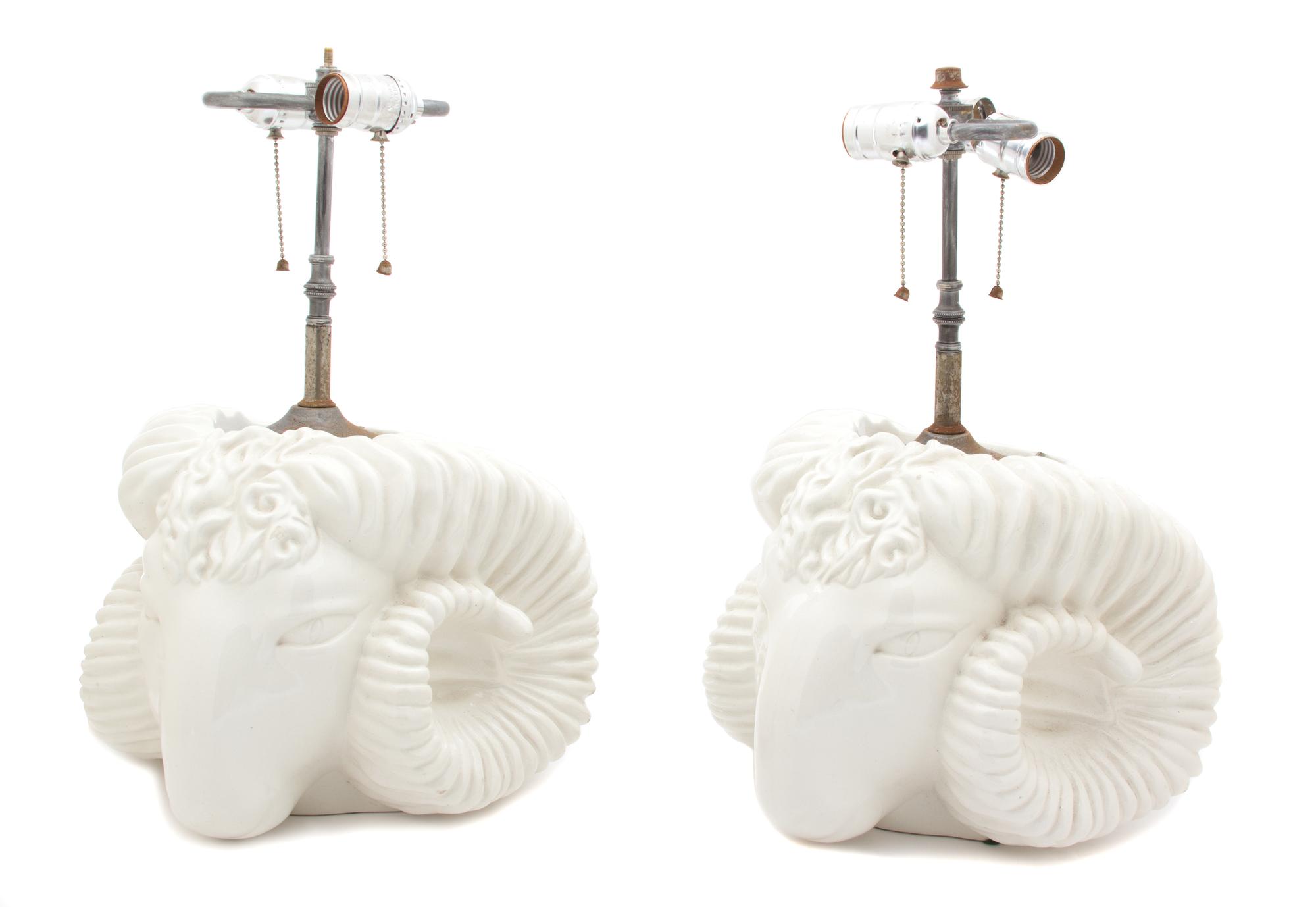 A Pair of Rams Head-Form Painted Ceramic Table Lamps Height overall 18 inches. — 20TH CENTURY