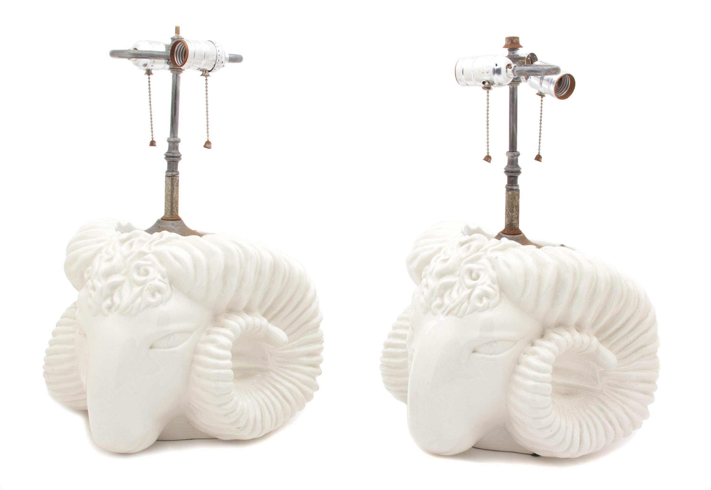 A Pair of Rams Head-Form Painted Ceramic Table Lamps Height overall 18 inches. — 20TH CENTURY