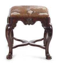 A George II Carved Walnut Footstool with Cowhide Upholstery