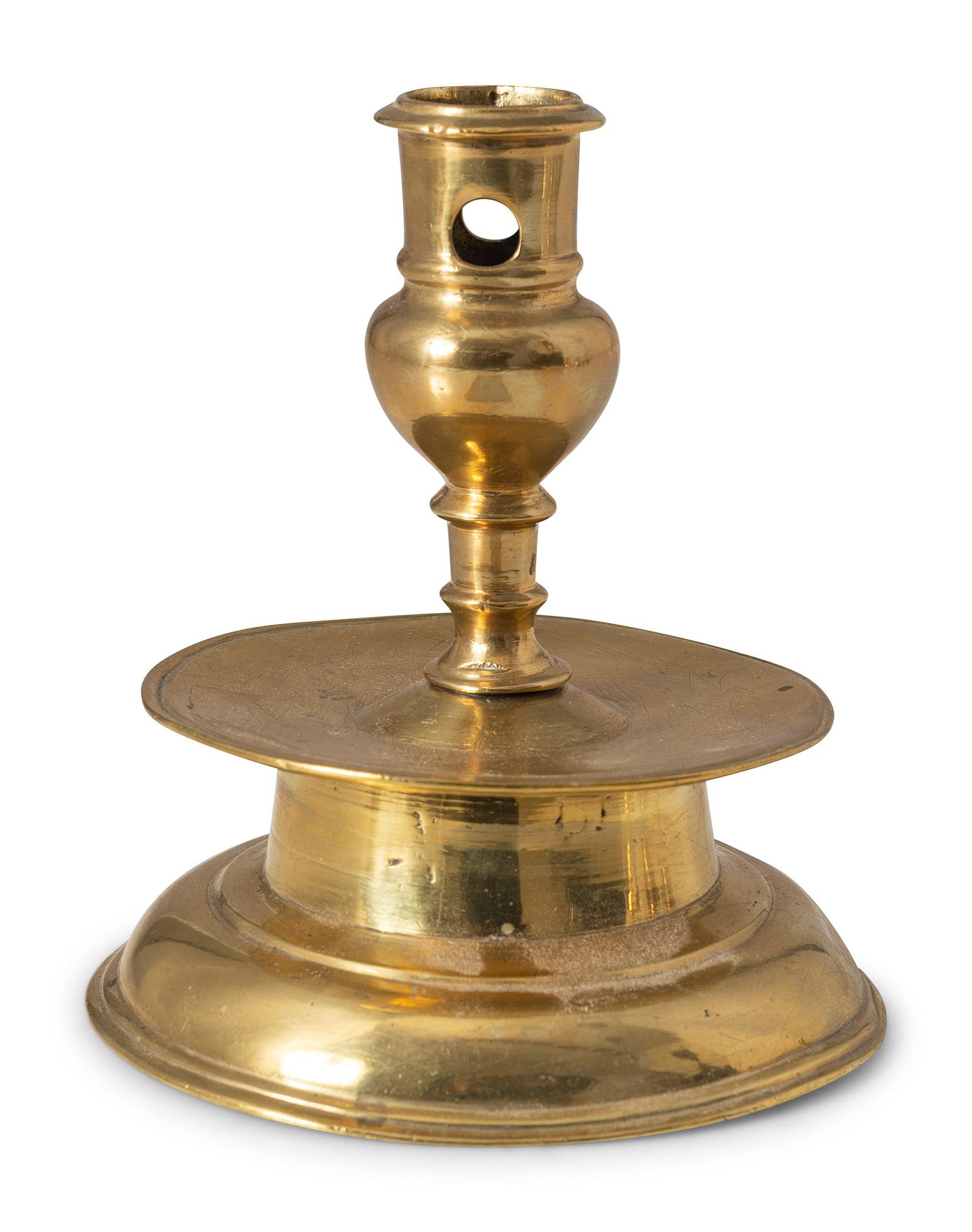 A Continental Brass Capstan Candlestick