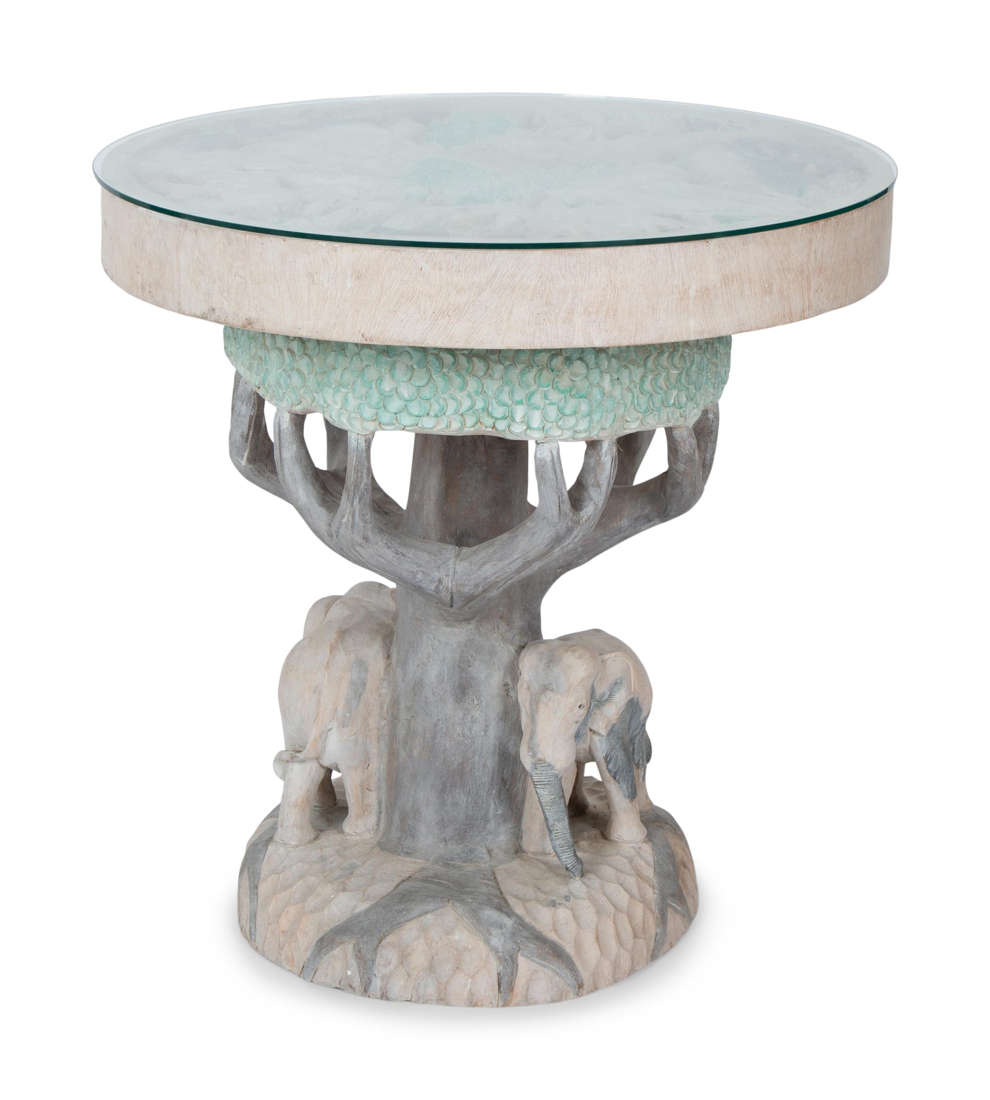 A Carved and Polychromed Wood Elephant Table with Glass Top — 20TH CENTURY