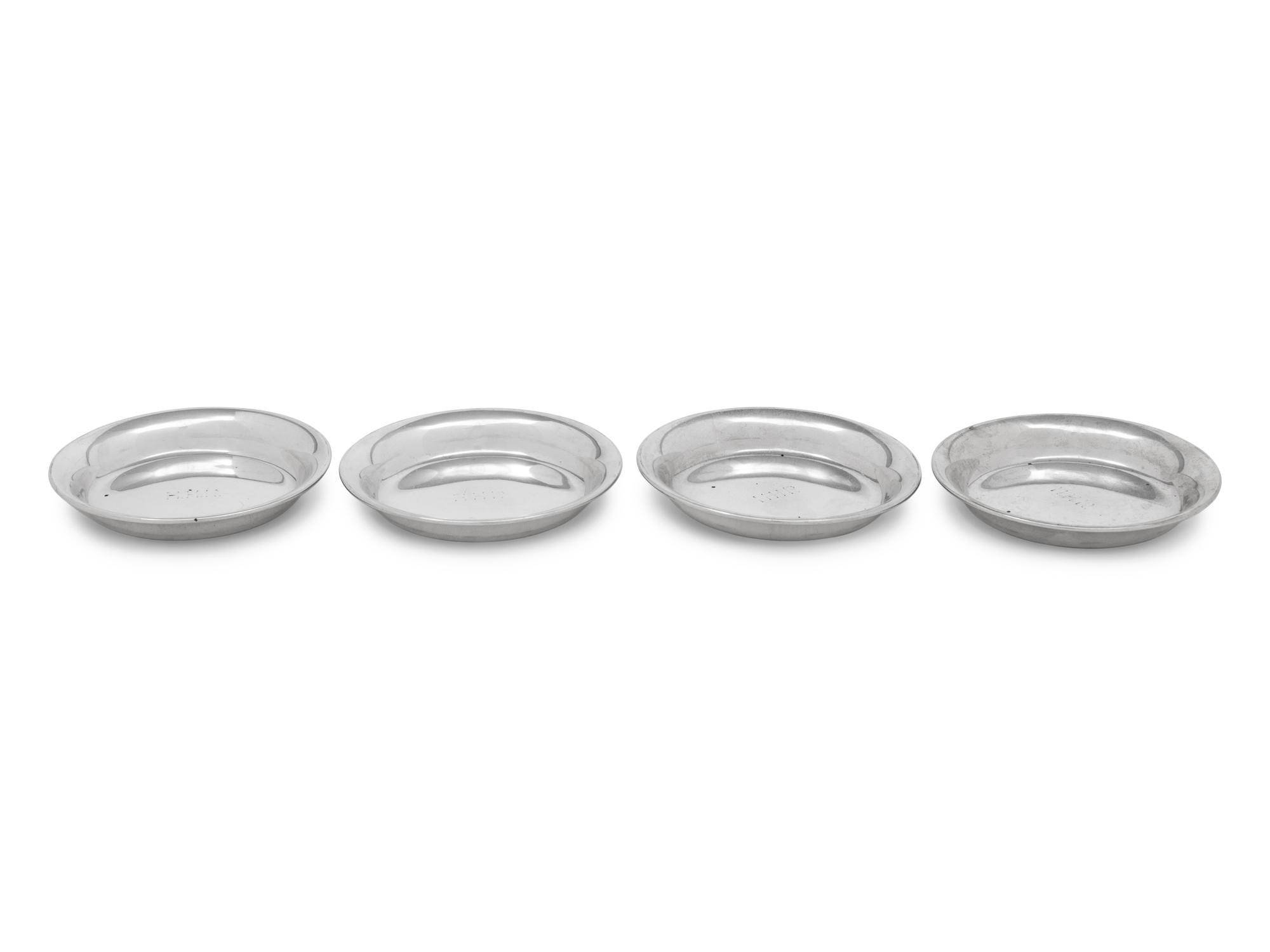 A Set of Four S. Kirk and Son Silver Butter Pats