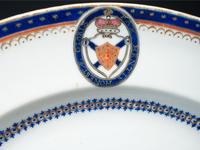 Four Chinese Export Porcelain Armorial Plates