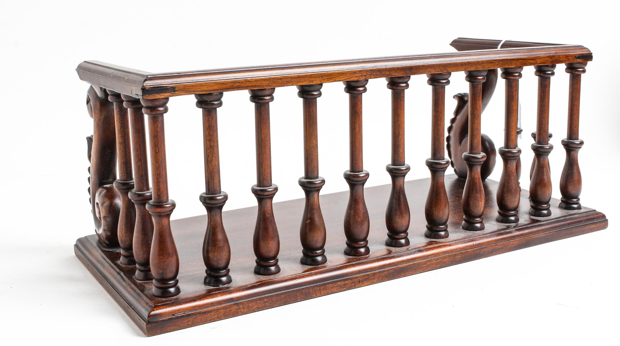 A Mahogany Gallery Height 6 3/8 x width 16 5/8 x depth 7 5/8 inches.