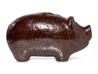 An Ohio Brown-Glazed Sewer Tile Pig