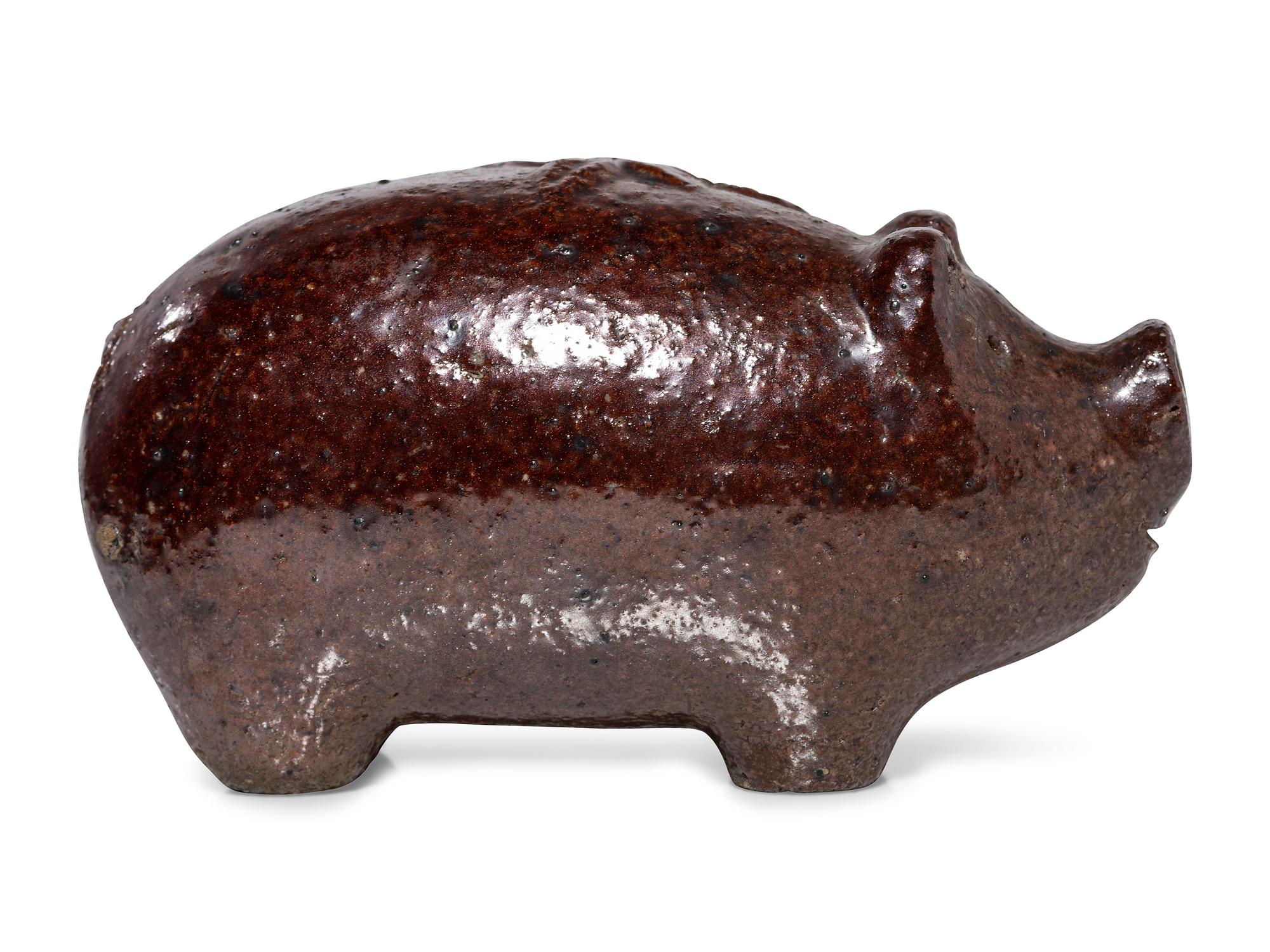 An Ohio Brown-Glazed Sewer Tile Pig