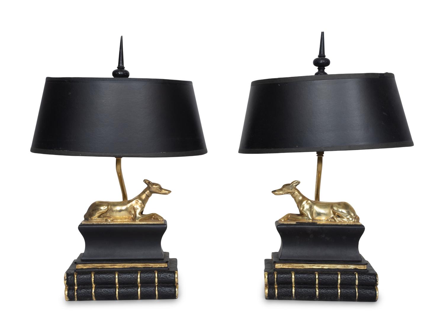 A Pair of Chapman Parcel Gilt Recumbent Canine Lamps