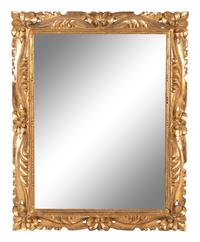 An Italian Baroque Style Giltwood Mirror