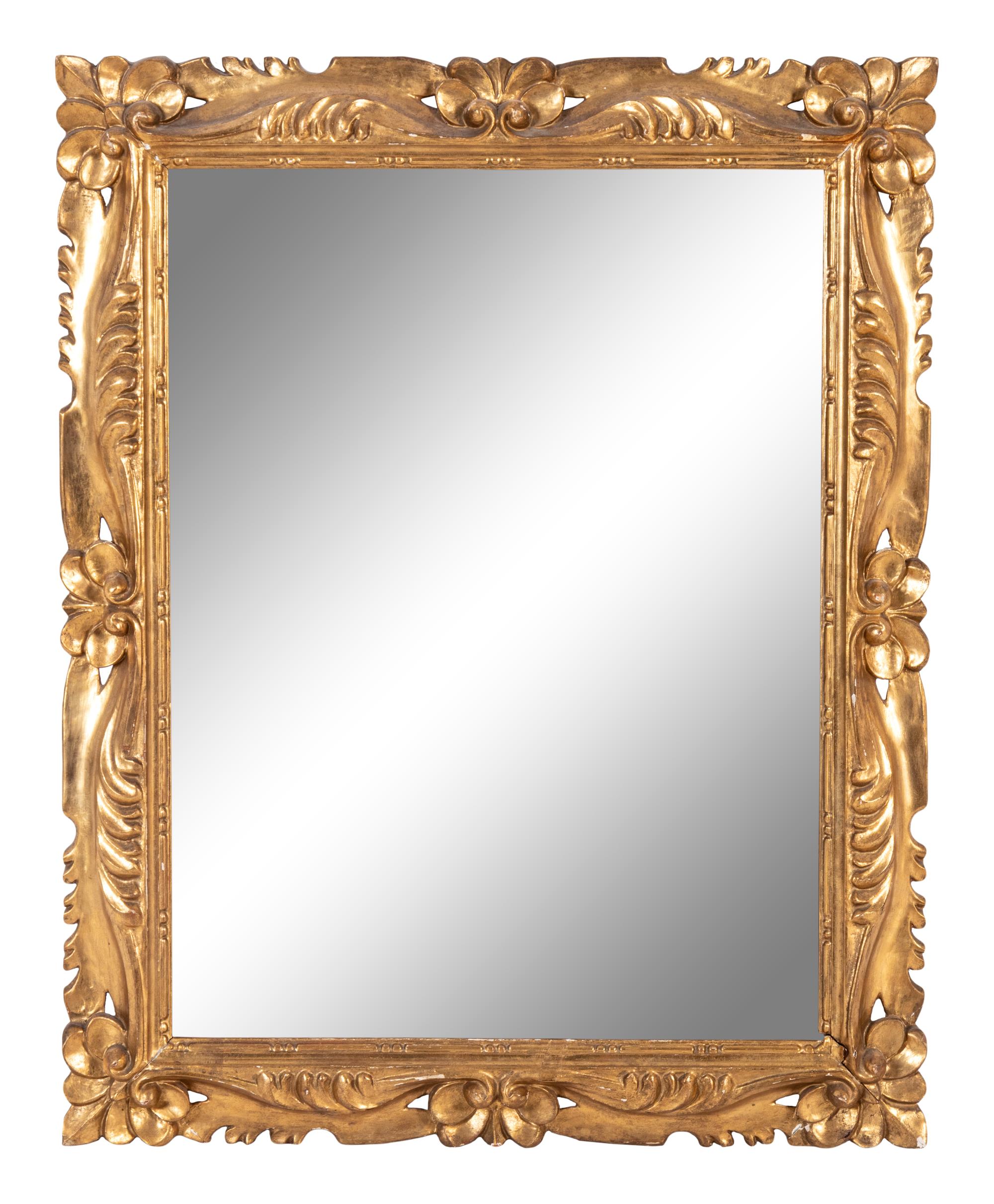 An Italian Baroque Style Giltwood Mirror
