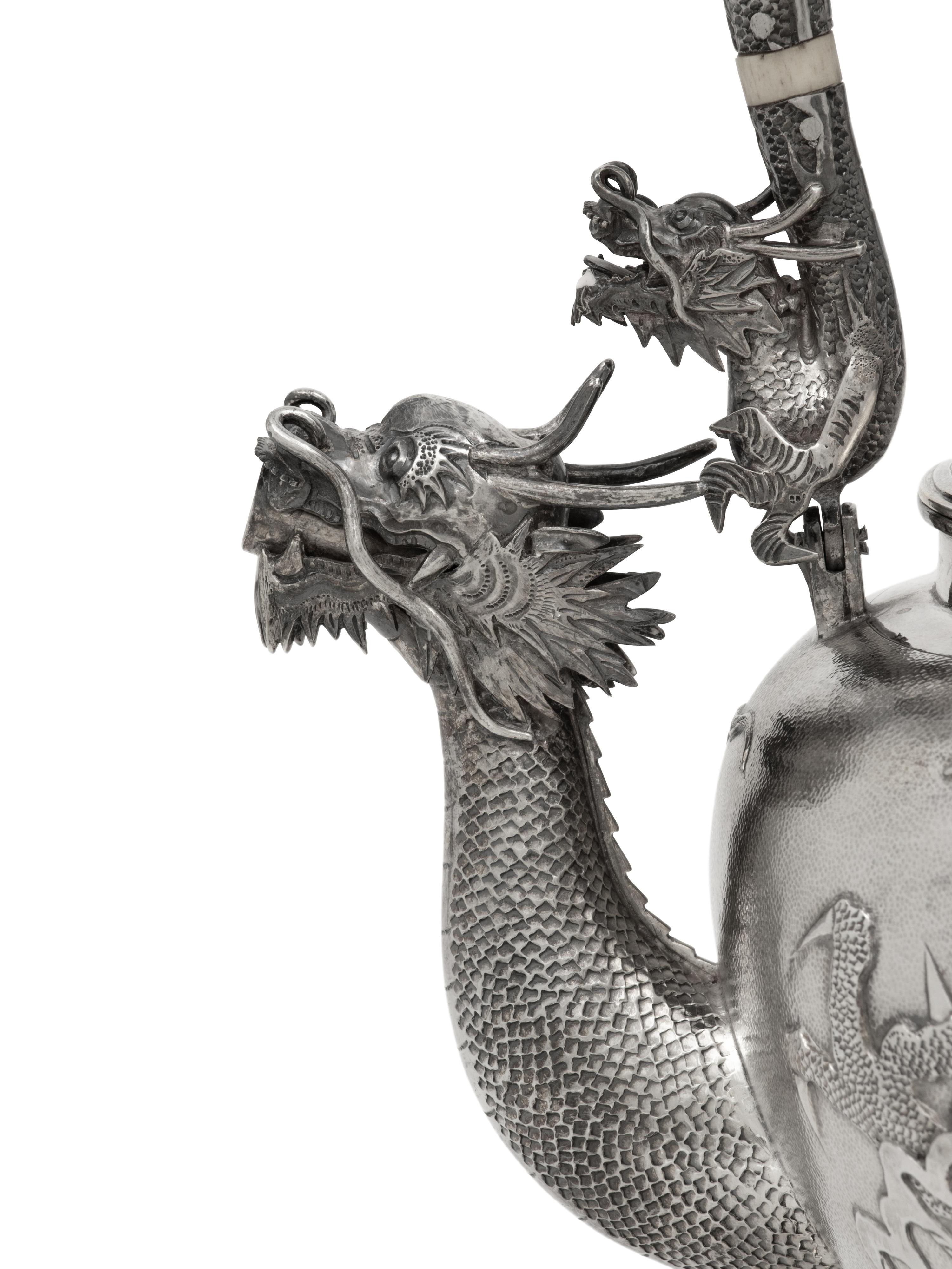 A Chinese Export Silver Seven-Piece Tea and Coffee Service
