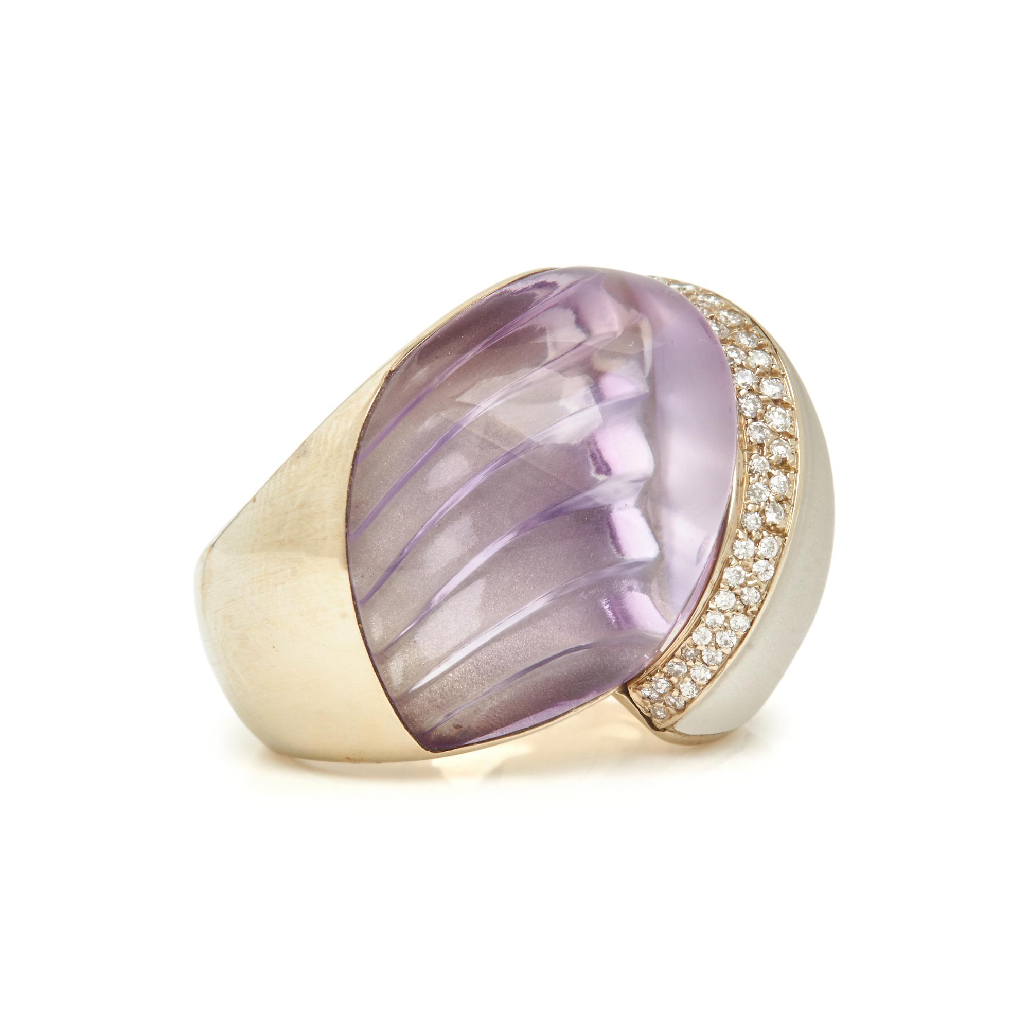 WHITE GOLD, CARVED AMETHYST, ROCK CRYSTAL AND DIAMOND RING