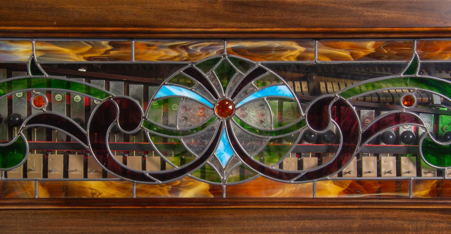 A Willard and Co. Mahogany and Leaded Glass Orchestrion