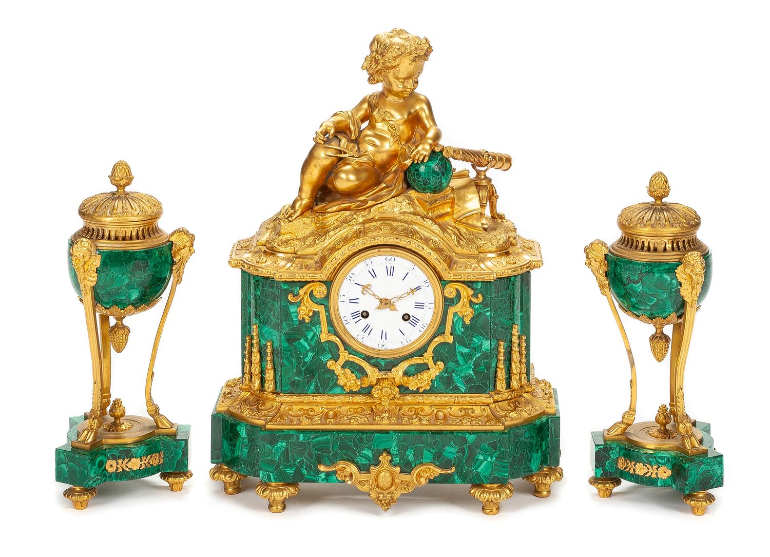 A French Gilt Bronze and Malachite Clock Garniture Height of mantel clock 20 inches. — 19TH CENTURY