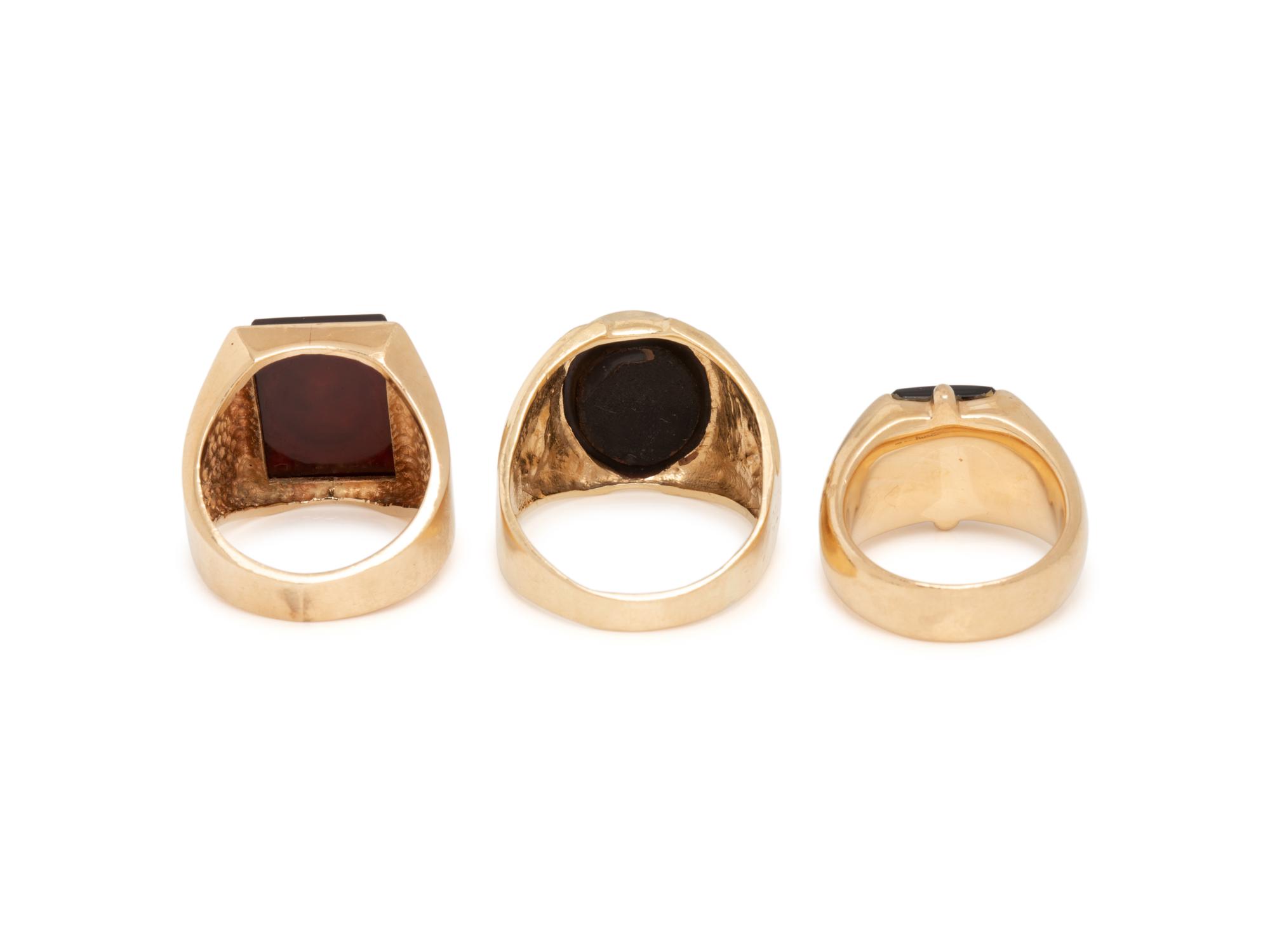 COLLECTION OF YELLOW GOLD SIGNET RINGS