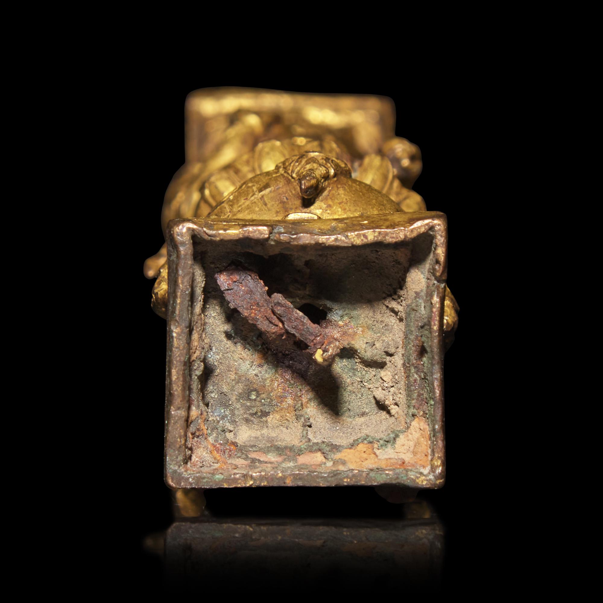 A Tibetan Gilt Copper Alloy Double-Sided Stupa Column Support, Densatil Monastery, 14th/Early 15th Century — 十四-十五世紀早期 丹薩替寺銅鎏金雙面塔柱