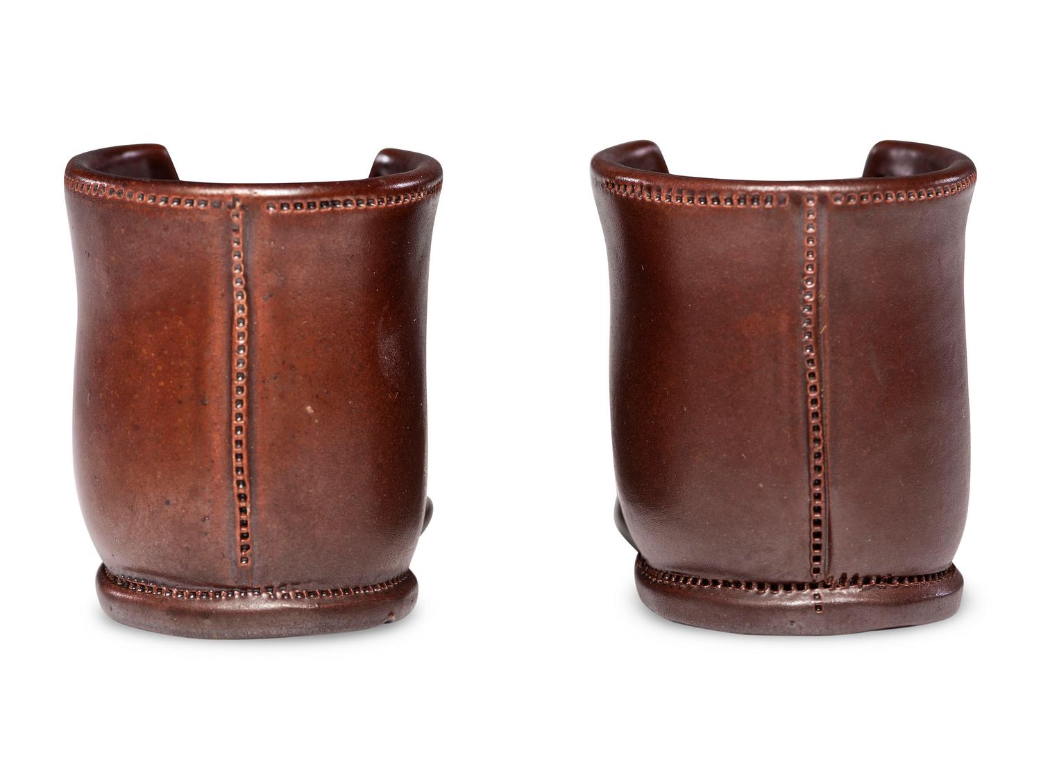 A Pair of Finely Crafted Glazed Pottery Shoes
