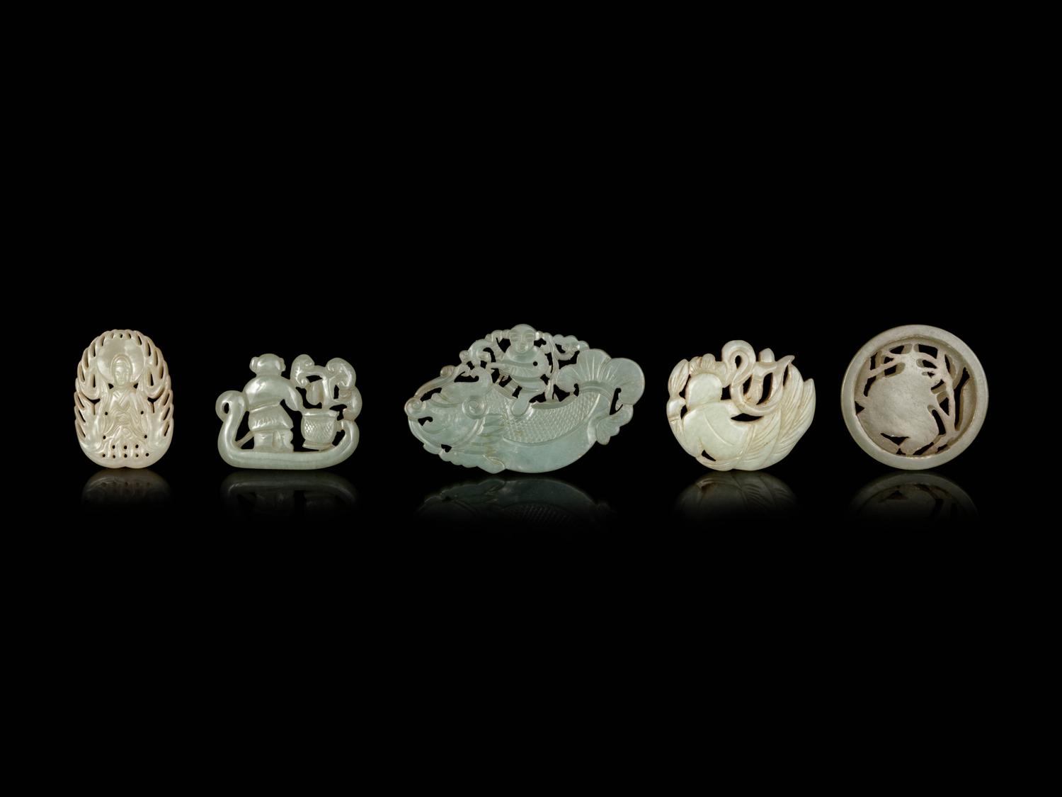 Five Chinese Celadon Jade Reticulated Figural Pendants