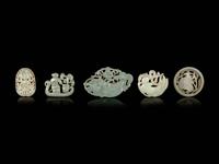 Five Chinese Celadon Jade Reticulated Figural Pendants