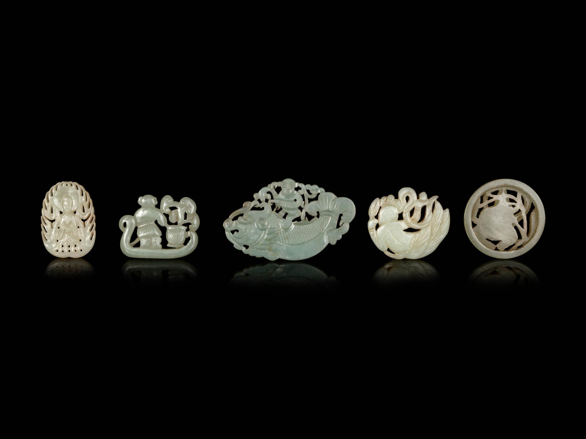 Five Chinese Celadon Jade Reticulated Figural Pendants