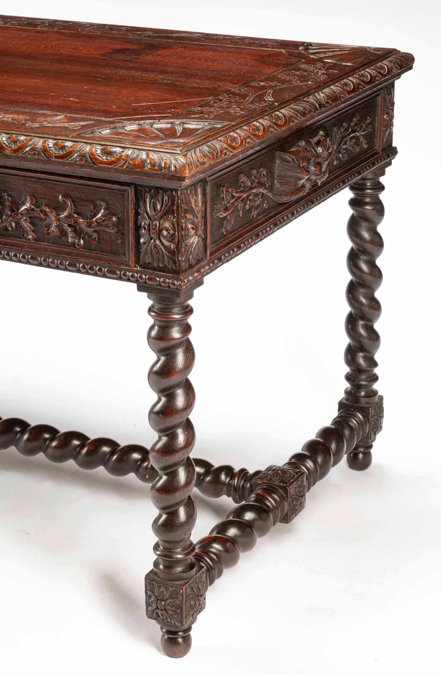 A French Renaissance Revival Carved Oak Library Table