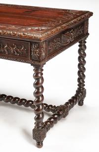A French Renaissance Revival Carved Oak Library Table