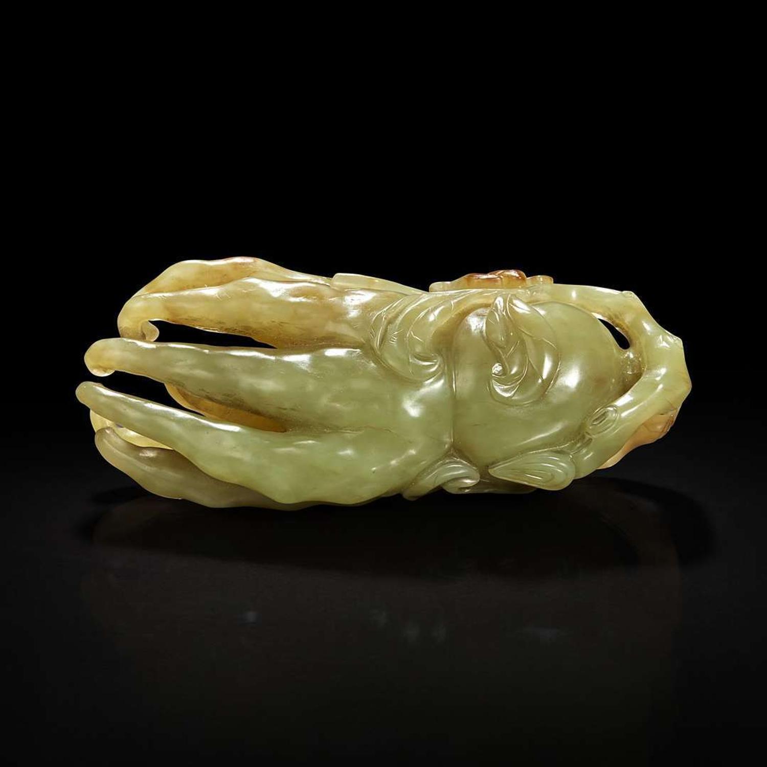 A Chinese celadon jade "Buddha's hand" citron pendant 青玉佛手