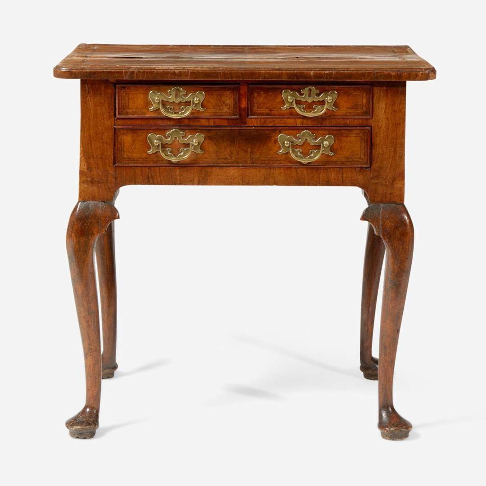 A Queen Anne inlaid and veneered walnut dressing table circa 1730