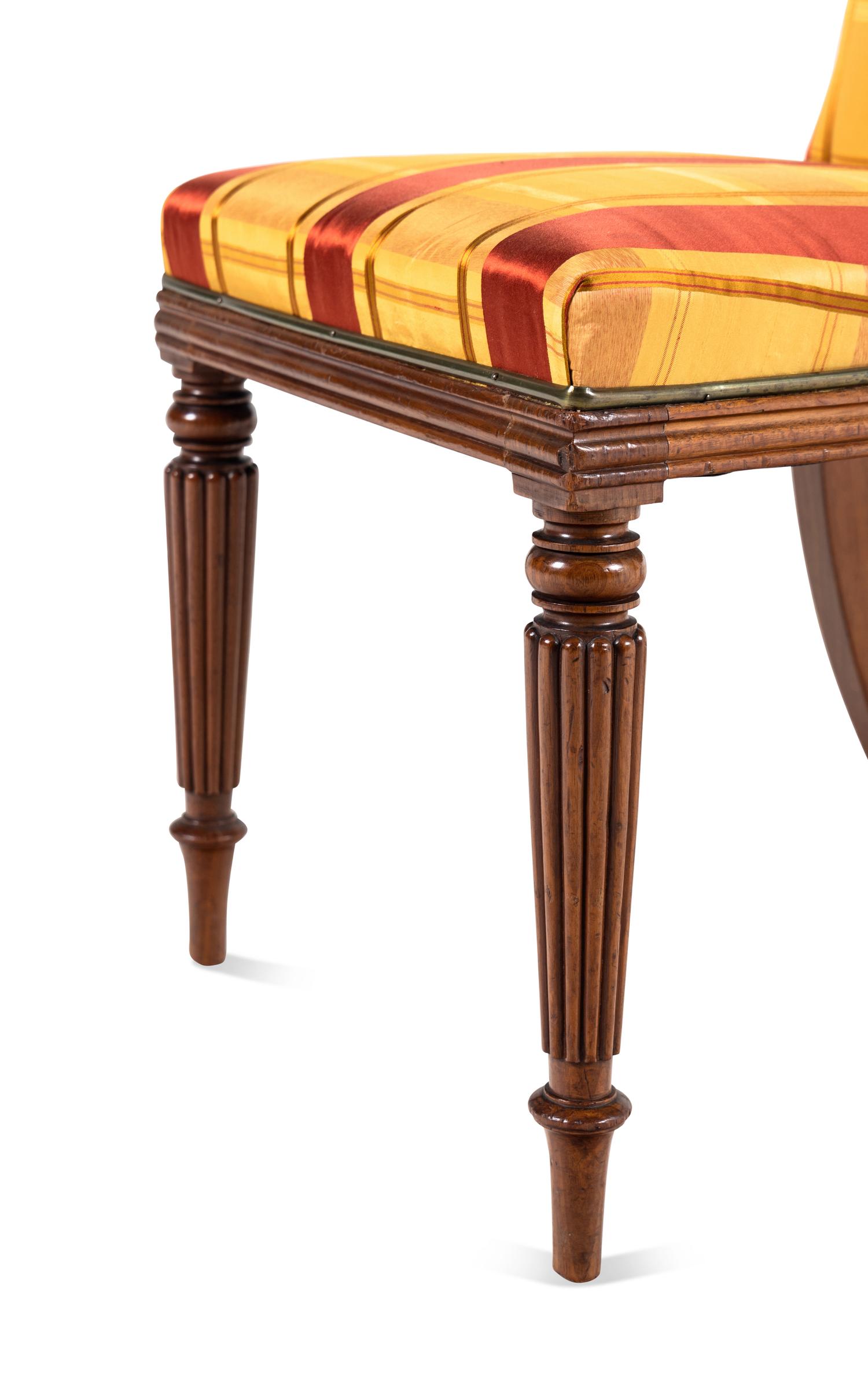 A Pair of Late Regency Brass Mounted Mahogany Side Chairs