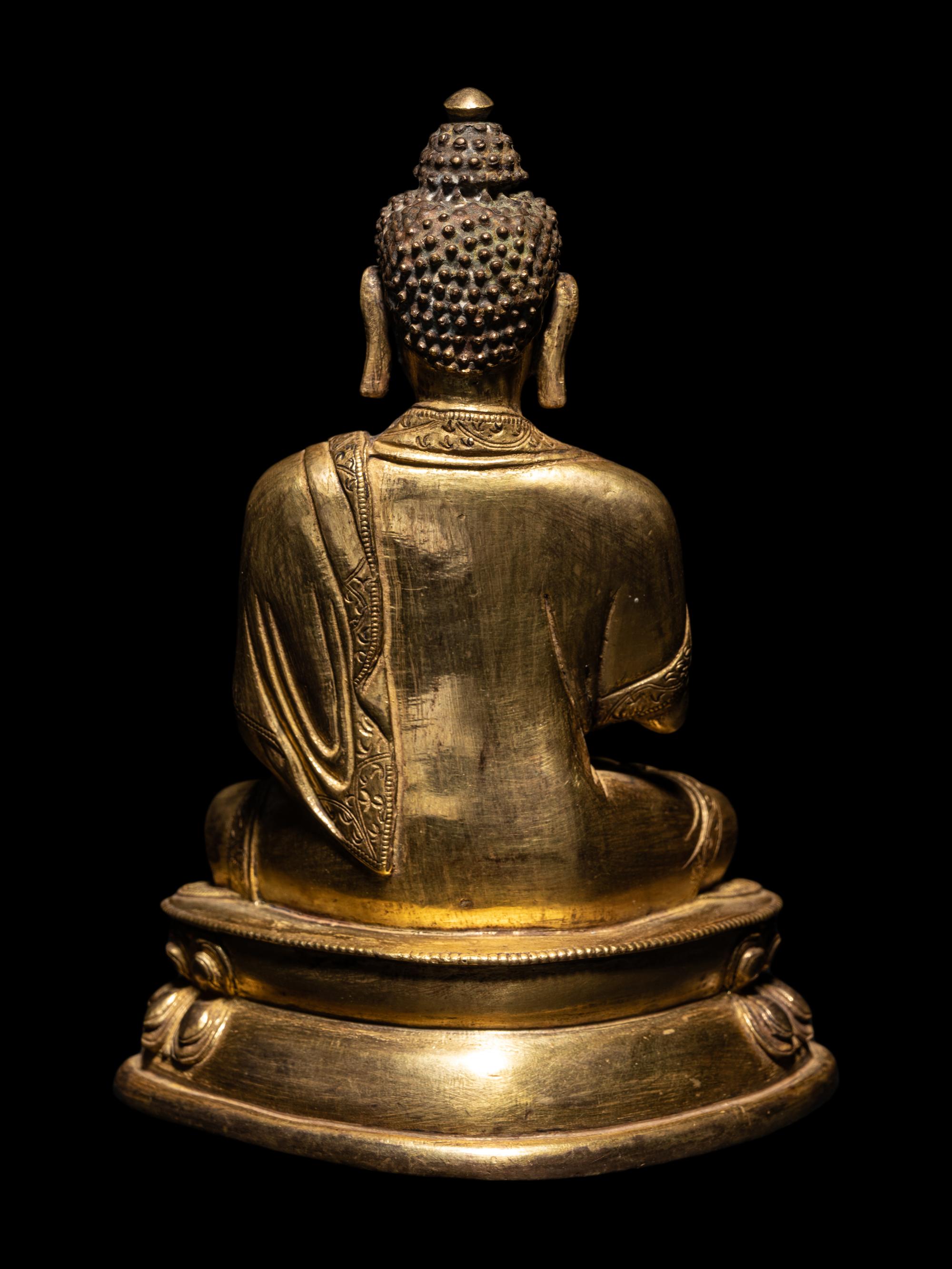 A Sino-Tibetan Gilt Bronze Seated Figure of Buddha Shakyamuni