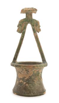 A Chinese Green Glazed Pottery Well Height 16 1/4 inches. — HAN DYNASTY (206 B.C. - A.D. 220)