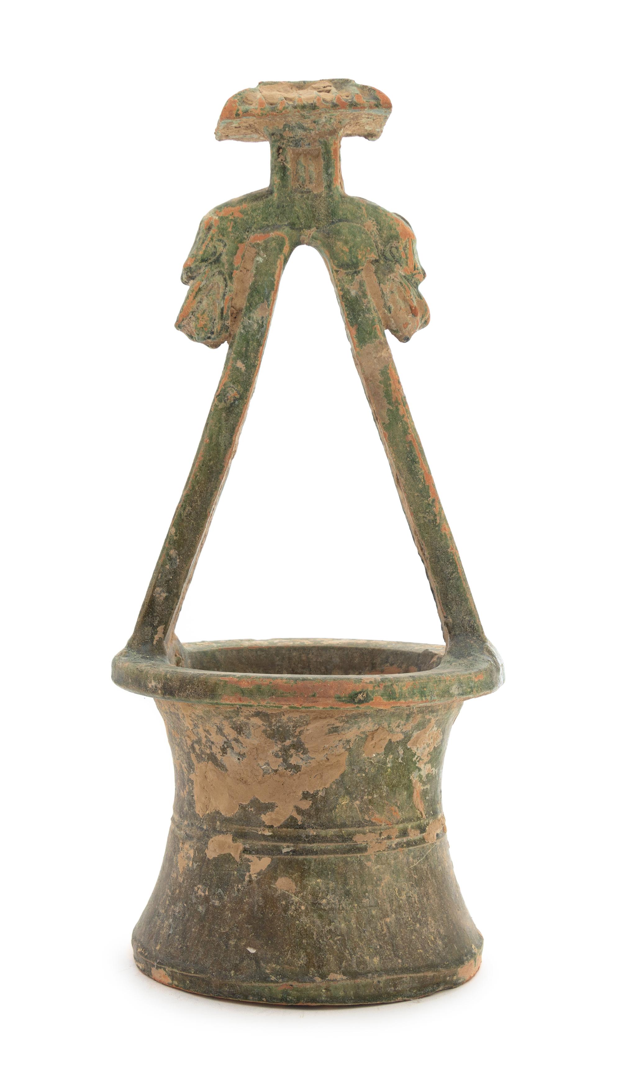 A Chinese Green Glazed Pottery Well Height 16 1/4 inches. — HAN DYNASTY (206 B.C. - A.D. 220)