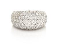 An 18 Karat White Gold and Diamond Band, 8.55 dwts.