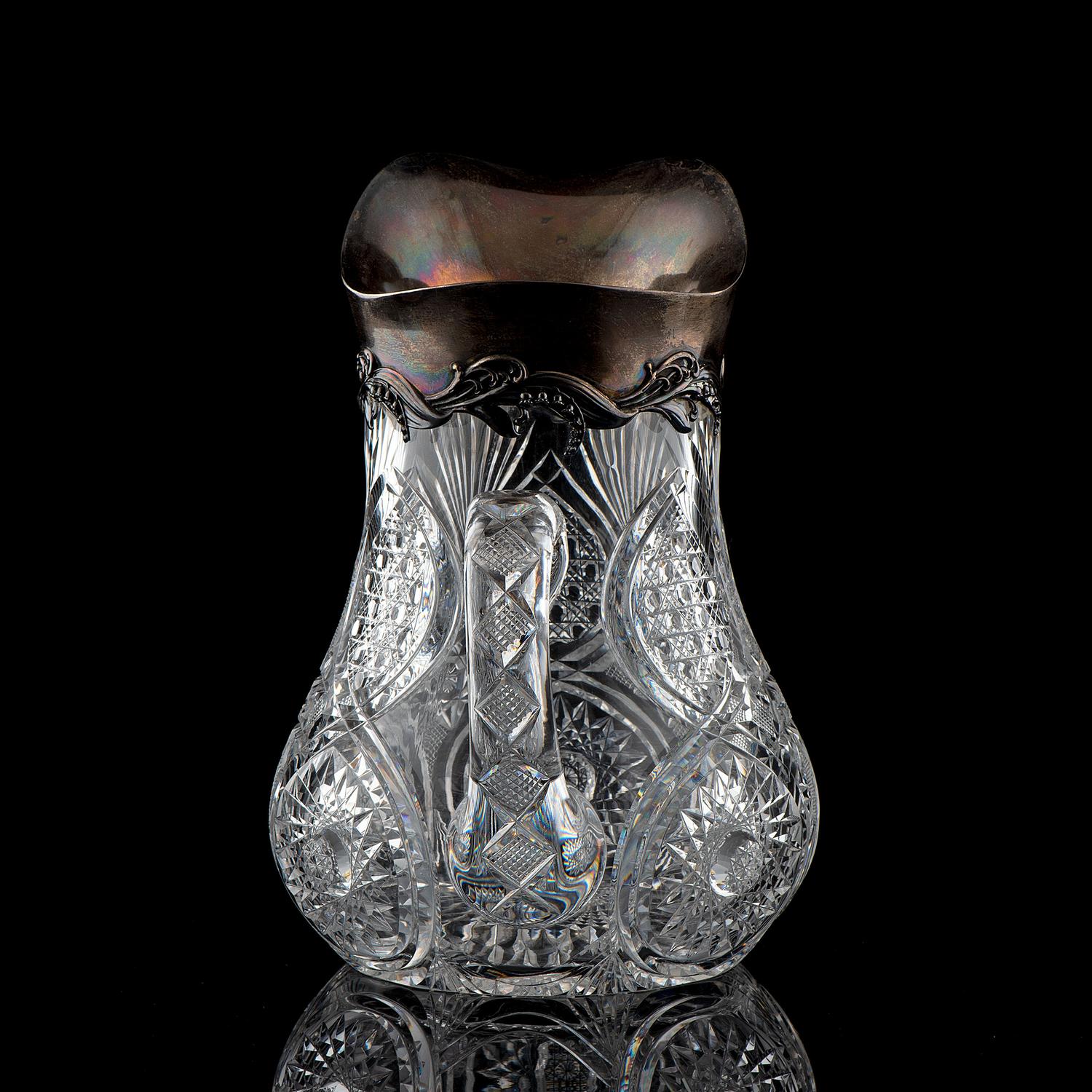A Brilliant-Period Cut Glass Water Pitcher with Lilies of the Valley and a Silver Mount