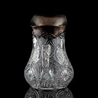 A Brilliant-Period Cut Glass Water Pitcher with Lilies of the Valley and a Silver Mount