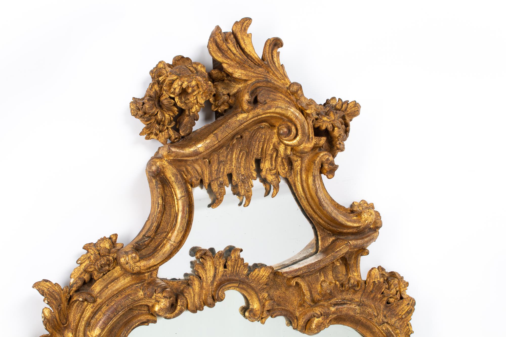 A Pair of Italian Carved Giltwood Girandole Mirrors