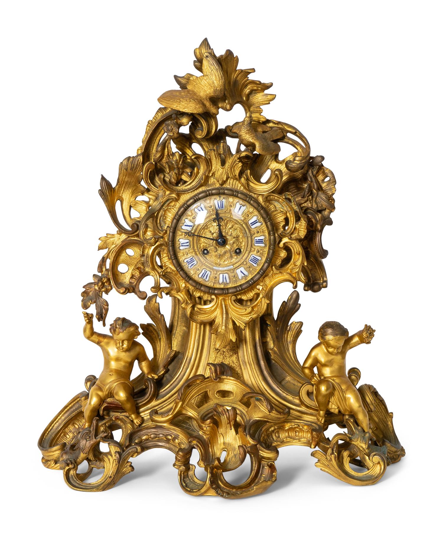 A French Rococo Style Gilt Bronze Mantel Clock