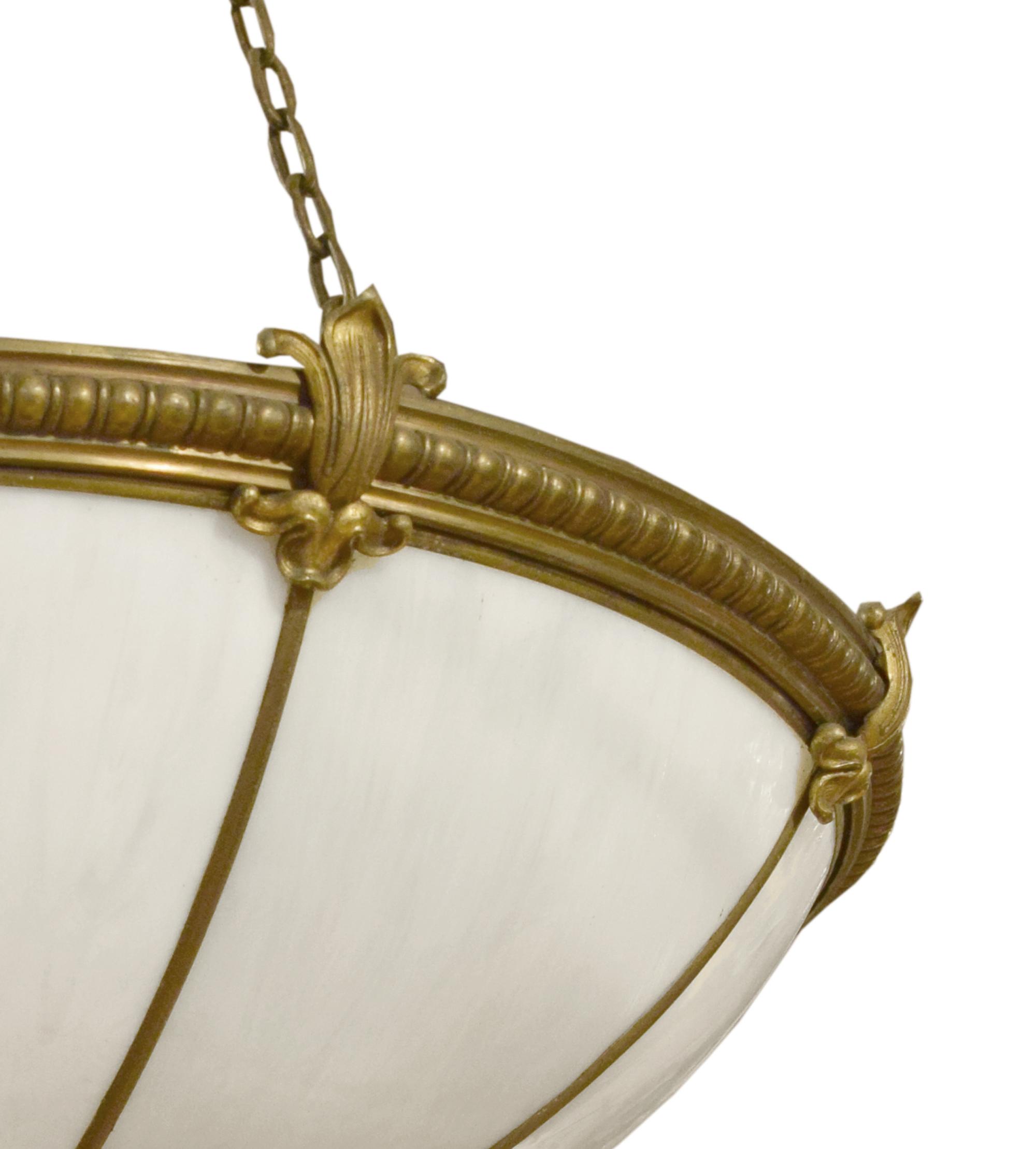 A Set of Four Bronze and Glass Chandeliers 24" W x 24" D x 44" H — United States, Circa 1920
