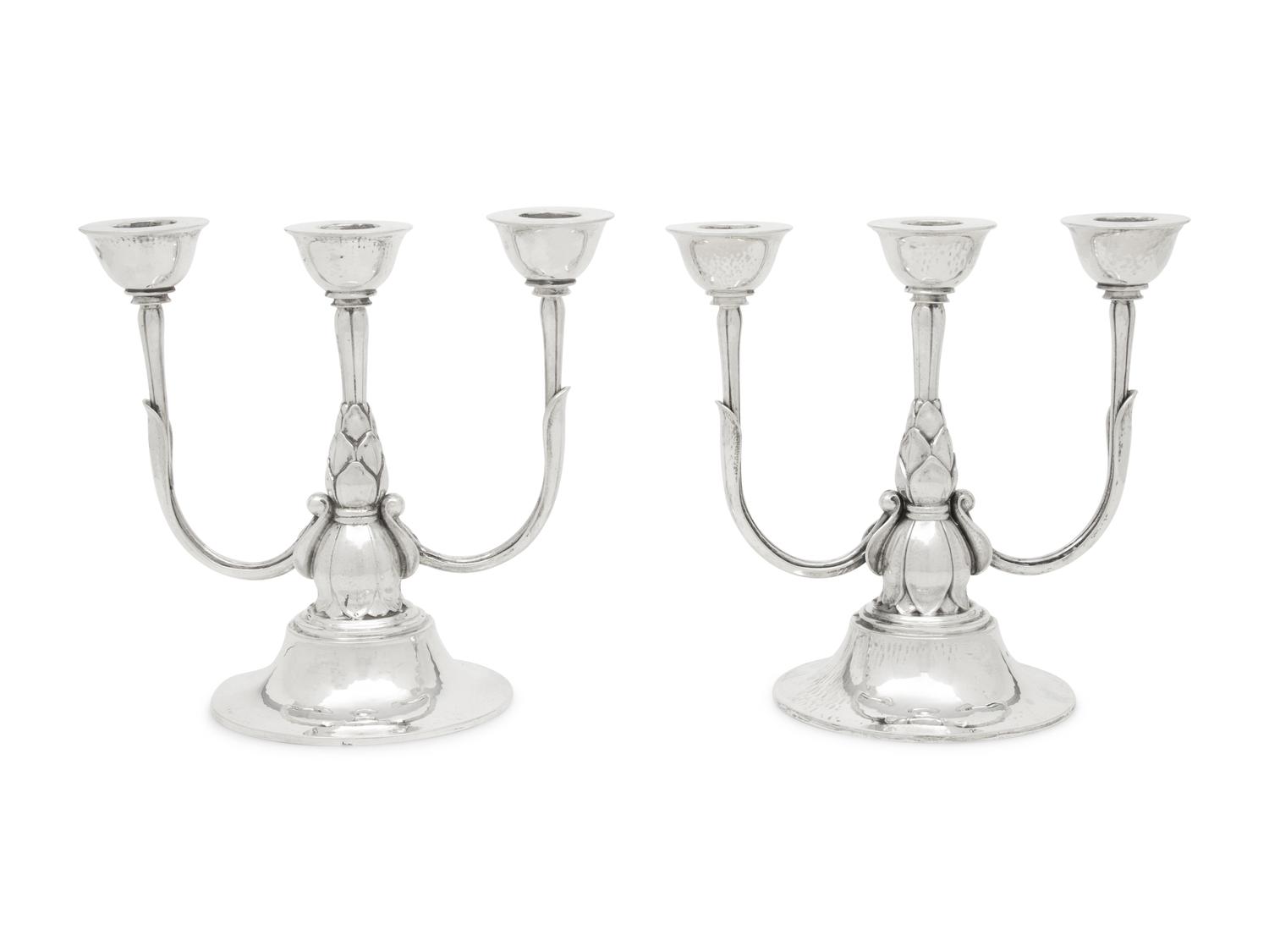 A Pair of Harald Nielsen for Georg Jensen Silver Three-Light Candelabra
