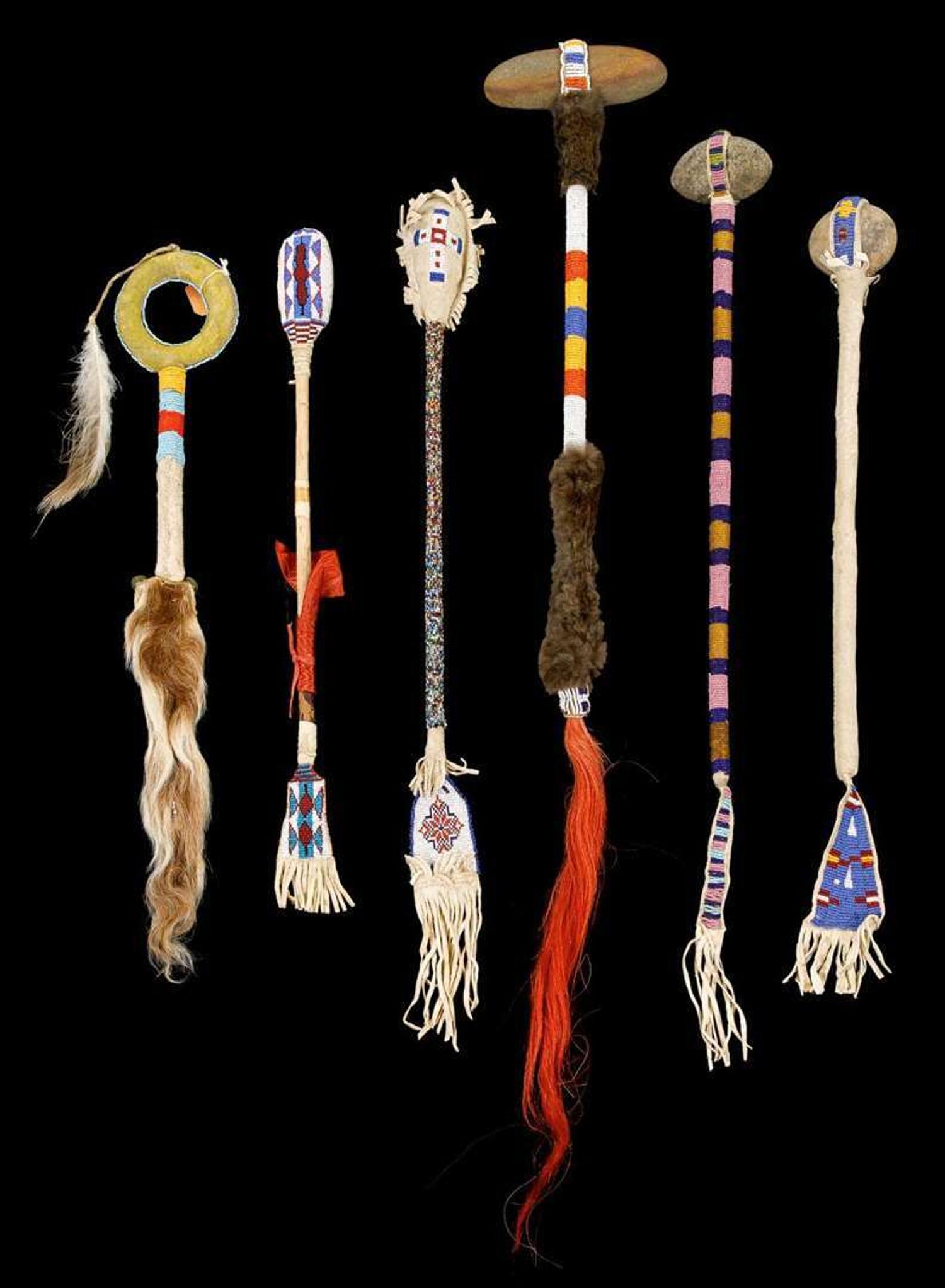 Beaded hide tomahawks, drum beaters and a rattle fort yates, north dakota, circa 1950