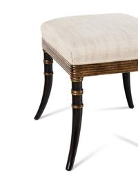 A Pair of Rose Tarlow Ebonized and Parcel-Gilt Stools