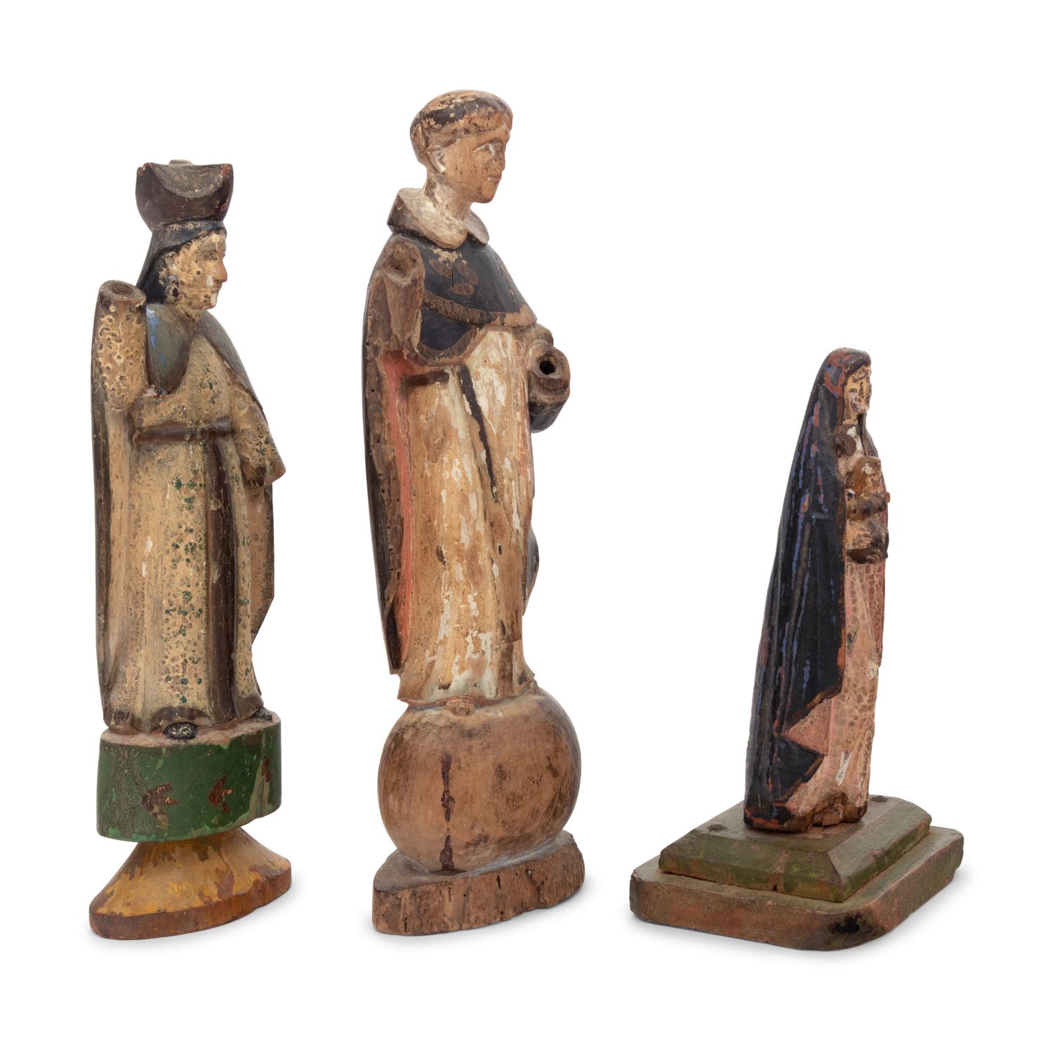 Three Carved and Polychrome Decorated Santos Figures