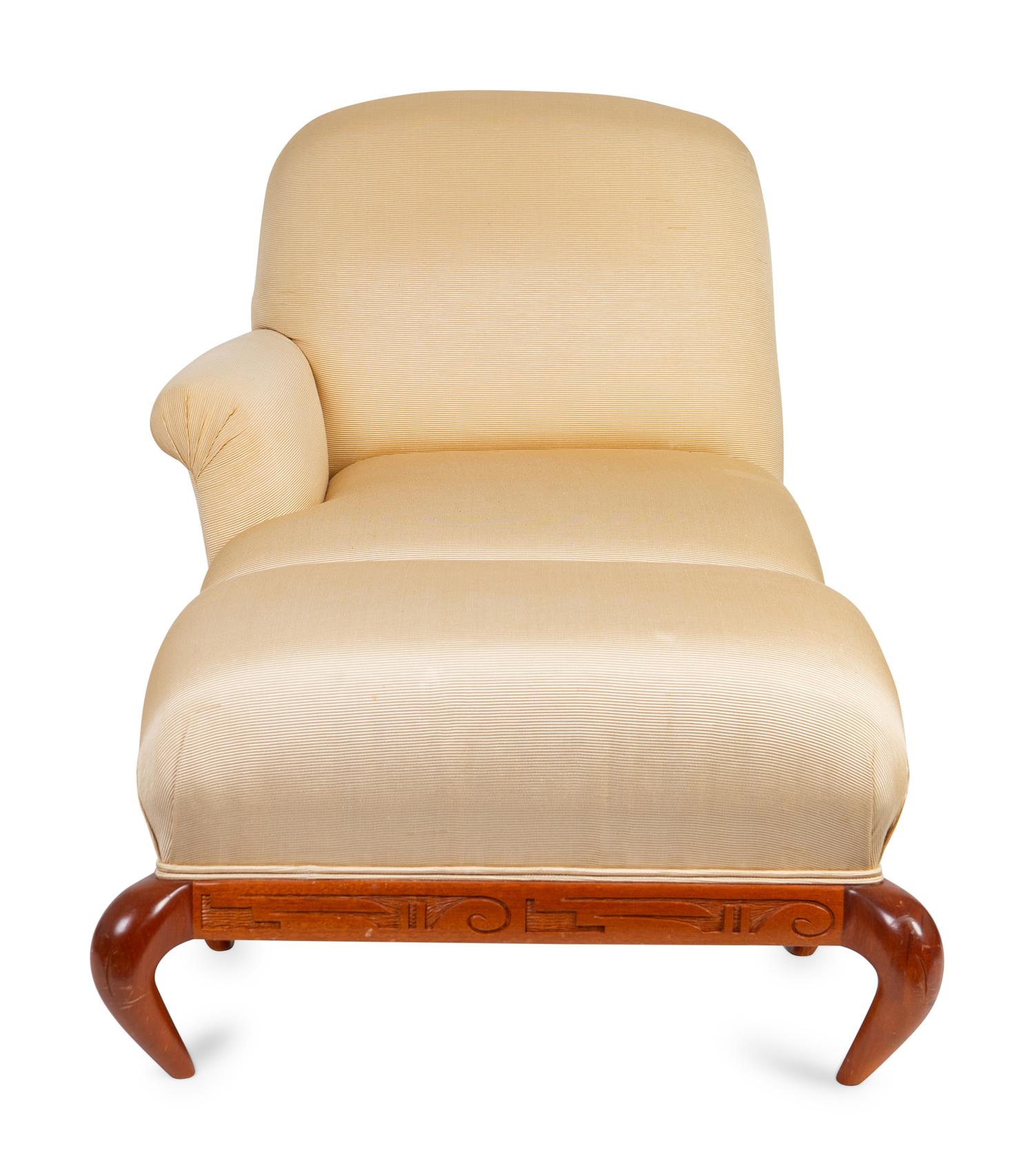 A Studio Craft Upholstered Chair and Ottoman