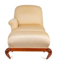 A Studio Craft Upholstered Chair and Ottoman