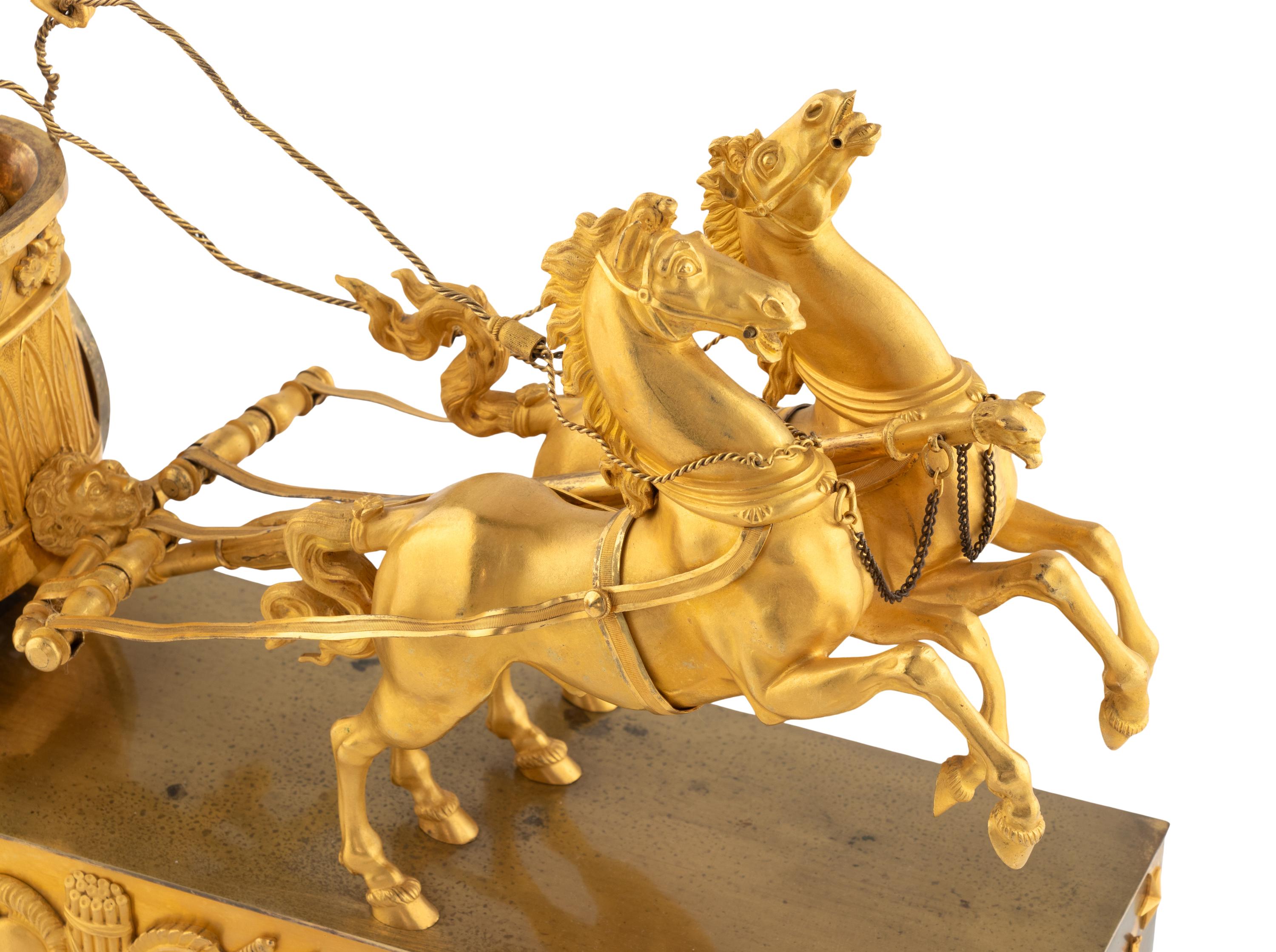 An Empire Gilt Bronze Figural Mantel Clock