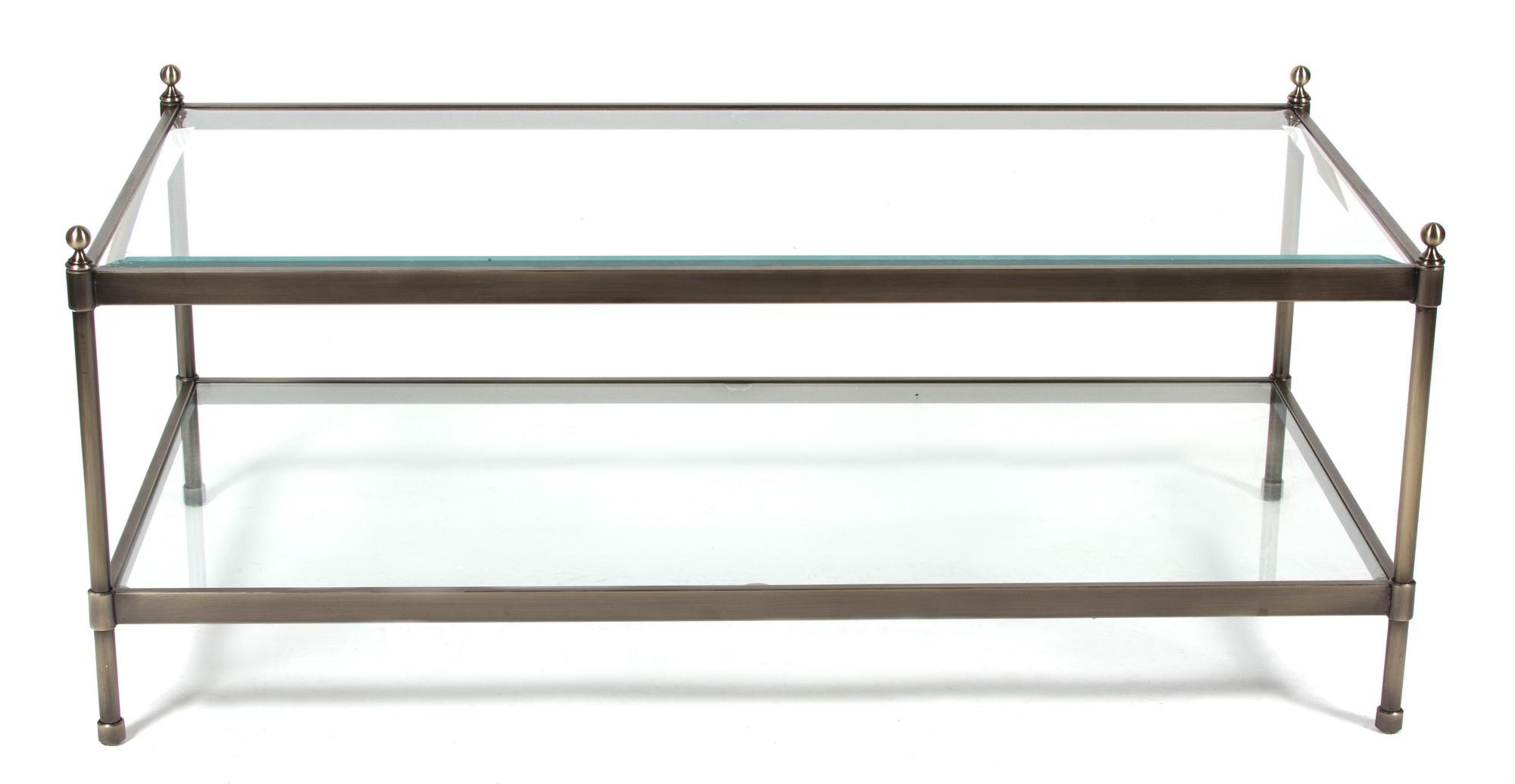 A Contemporary Brushed Steel and Beveled Glass Coffee Table Height 19 1/2 x width 48 x depth 24 inches. — 20TH CENTURY