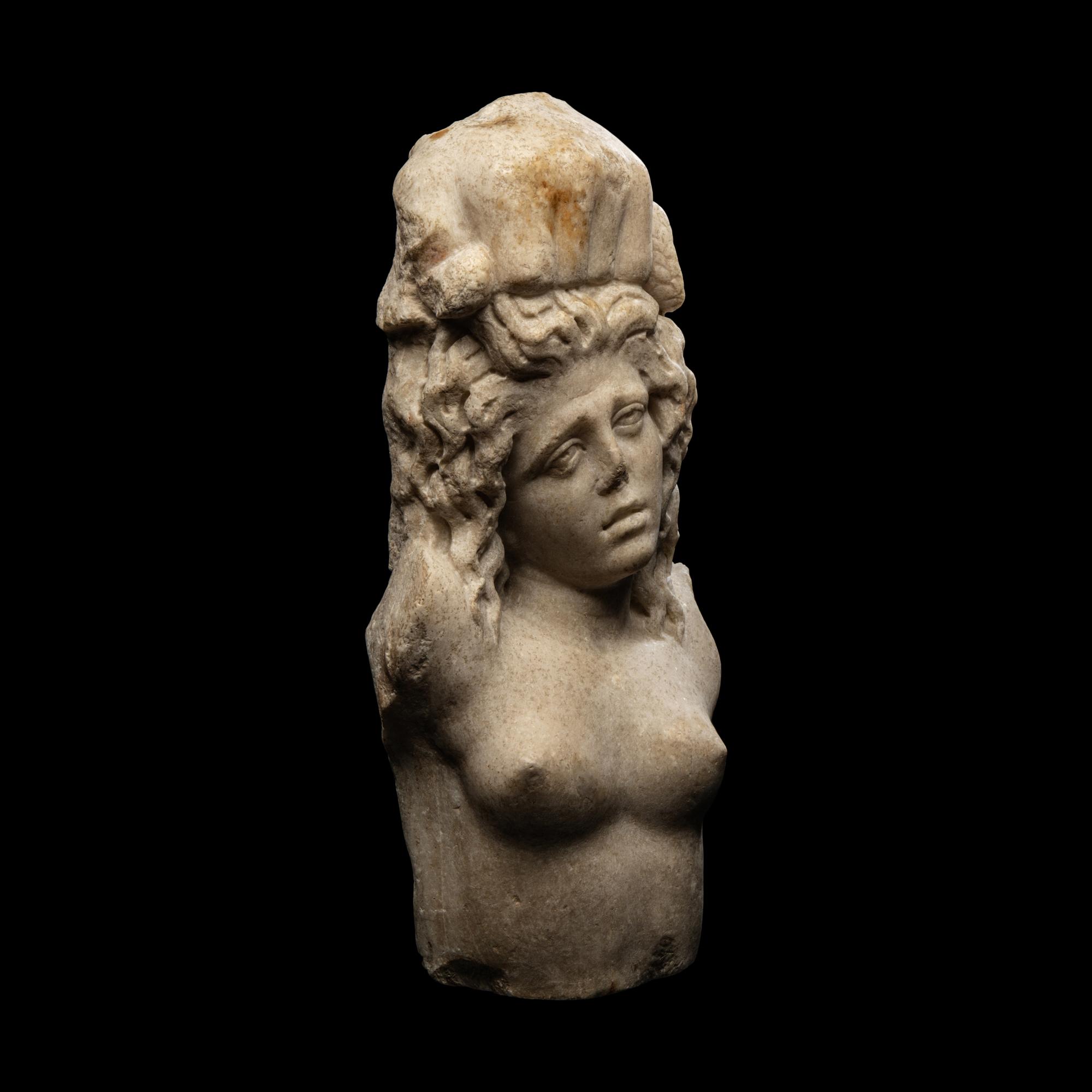 A Roman Marble Fragment with a Female Figure