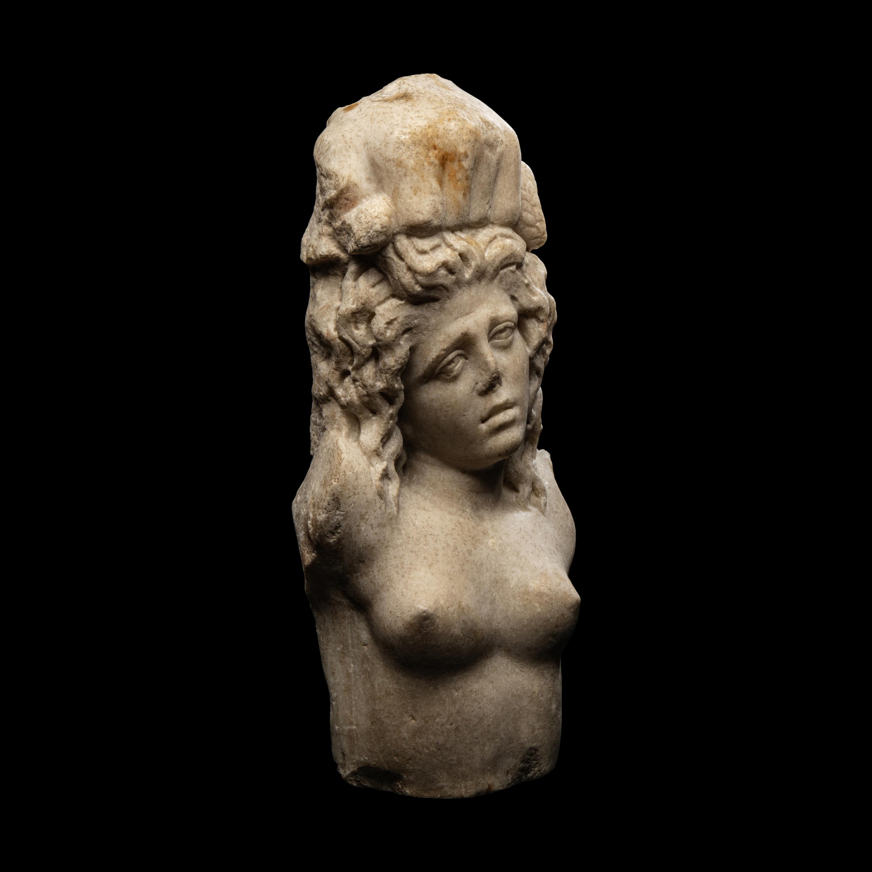A Roman Marble Fragment with a Female Figure