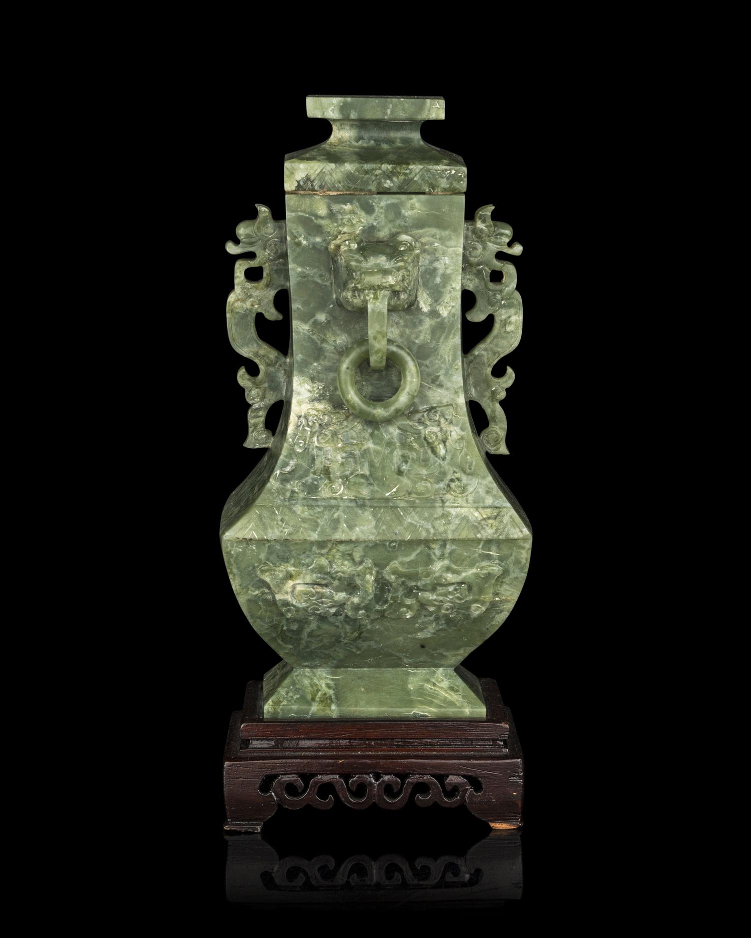 A Chinese Archaistic Green Hardstone Vase and Cover